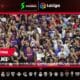 Seguidores de Barcelona y Real Madrid viendo el clásico español